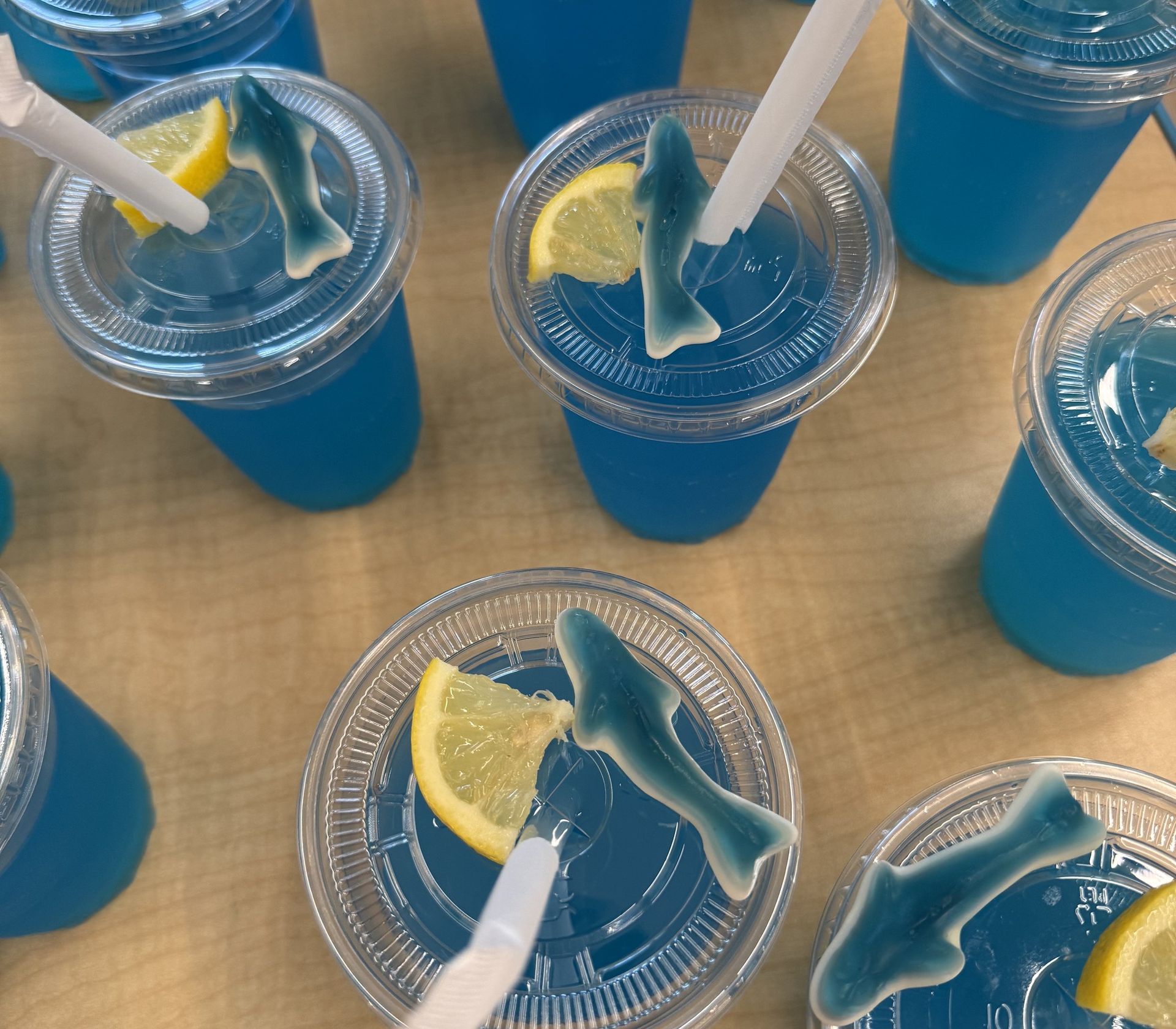 Blue shark lemonades with gummy sharks made at summer camp