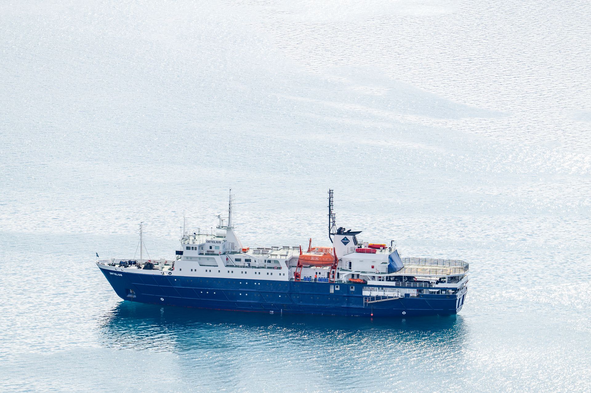 Oceanwide Expeditions ship Ortelius at anchor in the Liefdefjorden and Woodfjorden area of Svalbard in June 2025