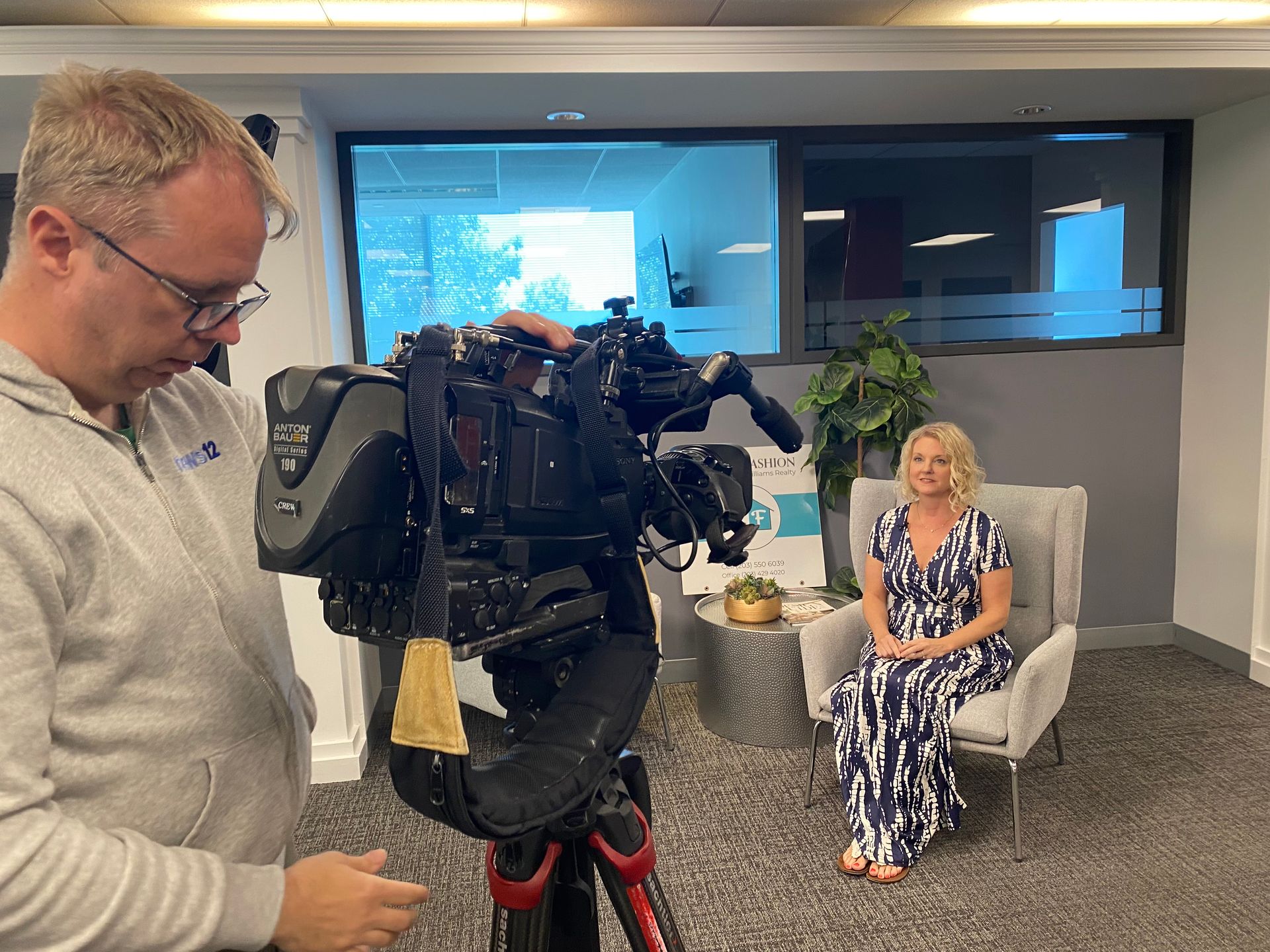 Kim being interviewed by a News 12 camera crew in the Fix and Fashion office