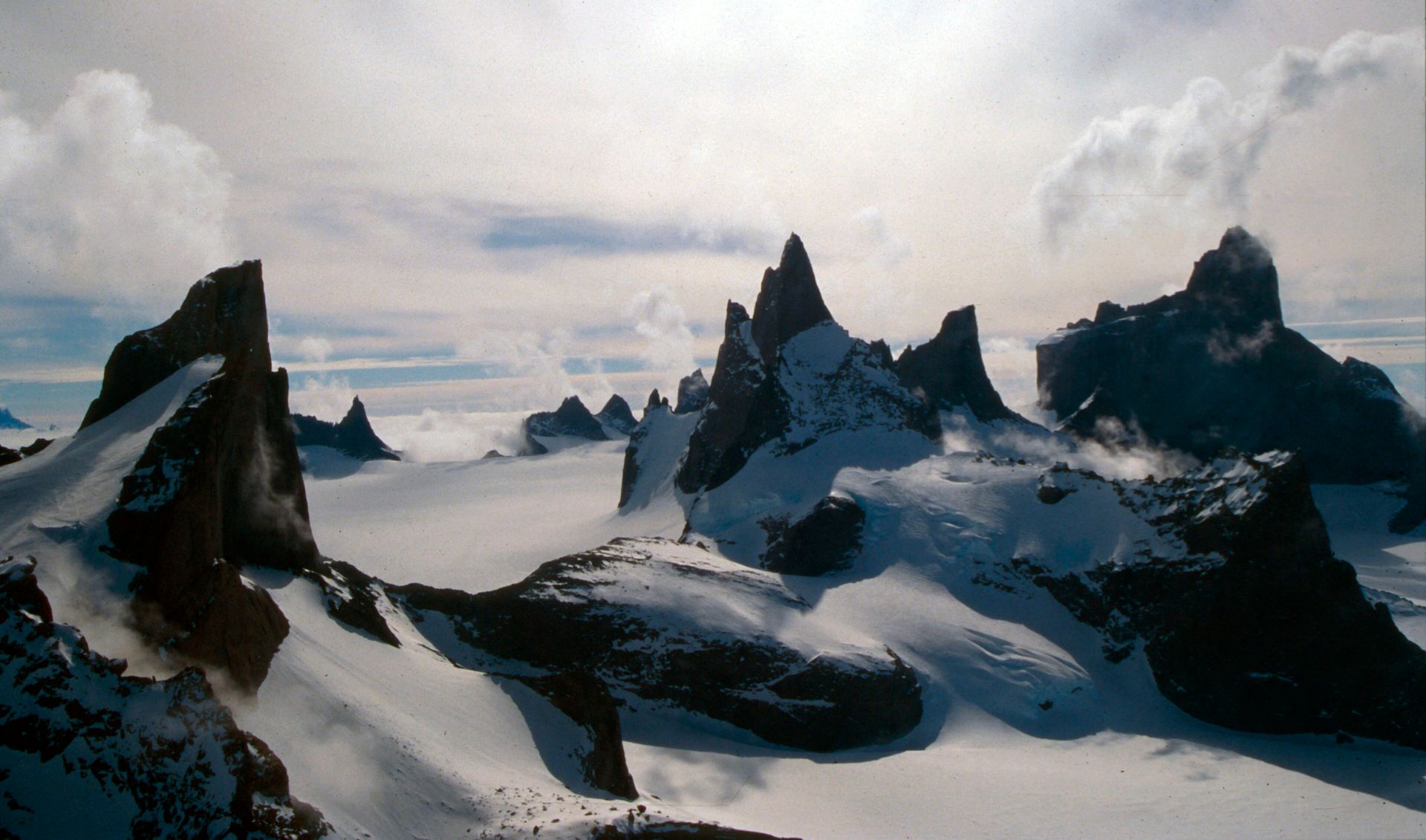 Granite spires of the southern Drygalski Mountains in Dronning Maud Land, with Ulvetanna (Wolf's Fang) on the right