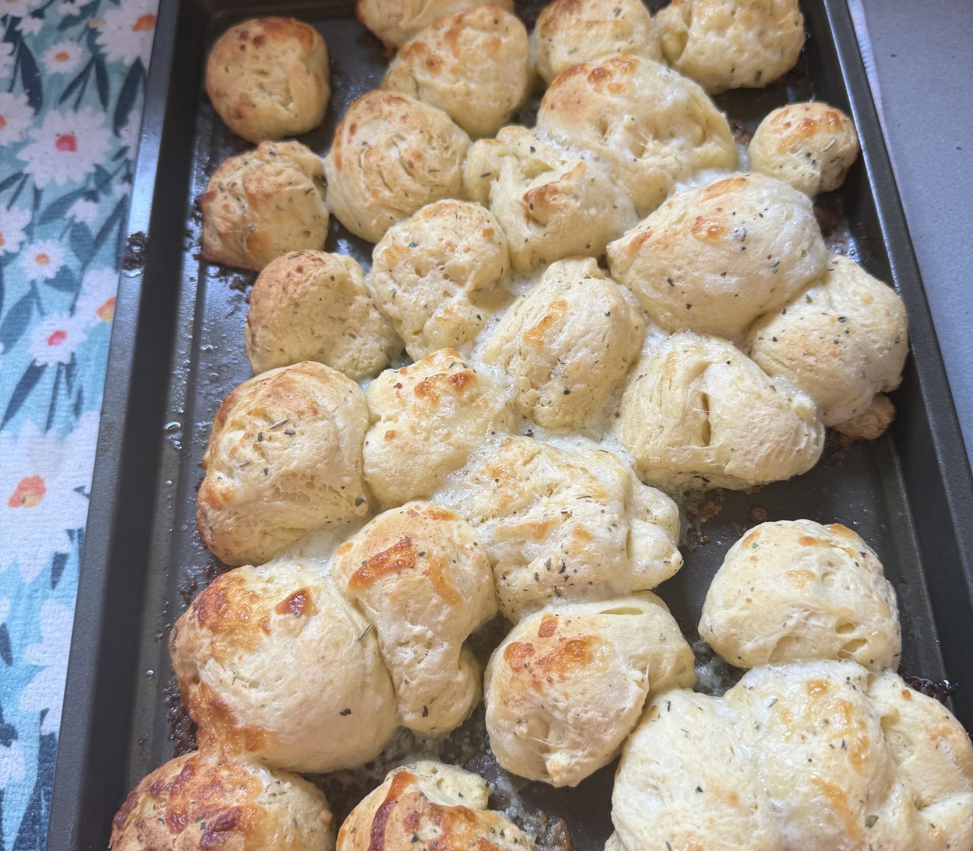 A tray of garlic knots baked at summer camp