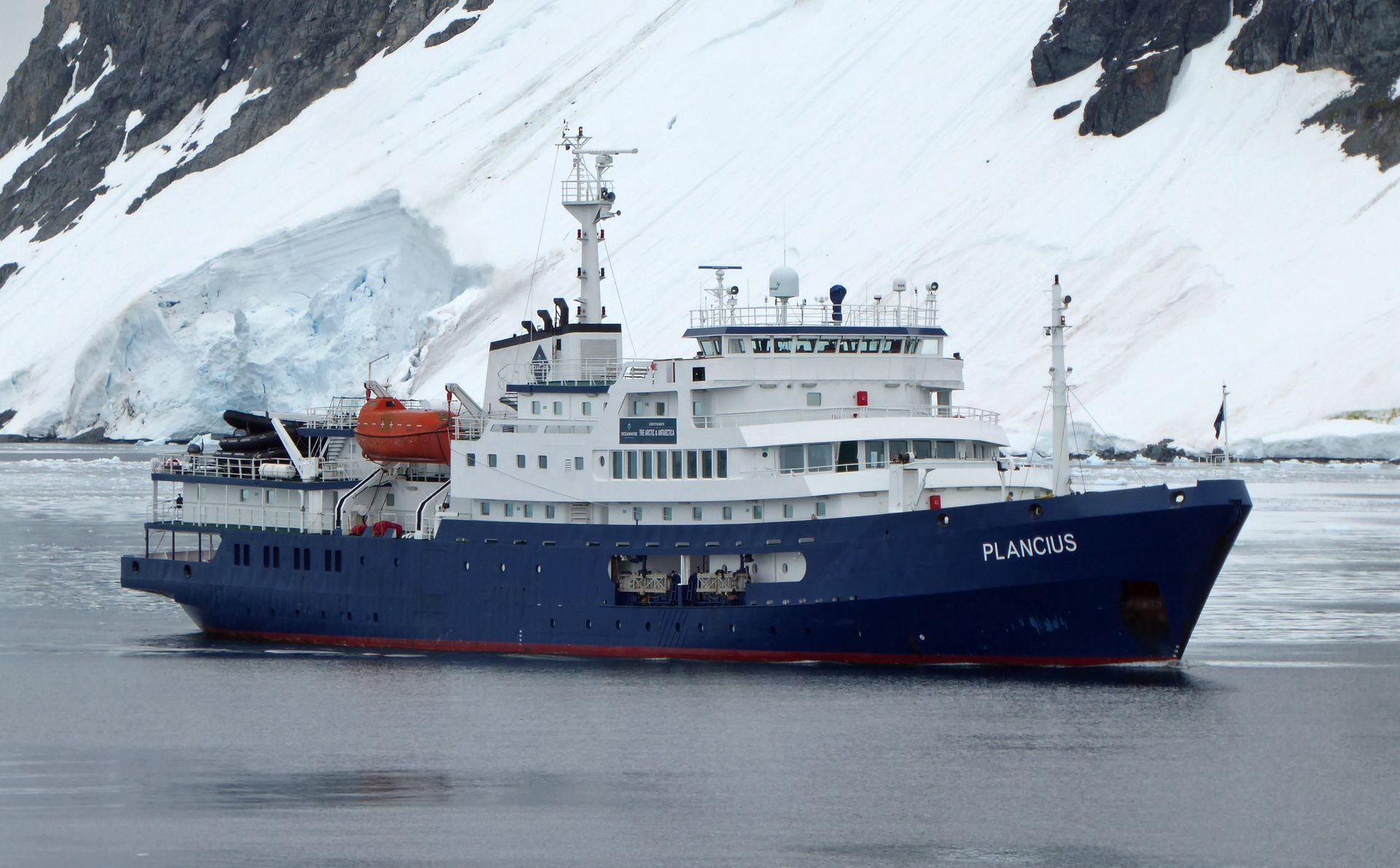 Oceanwide Expeditions ship Plancius in front of a glacier in Antarctica in January 2020