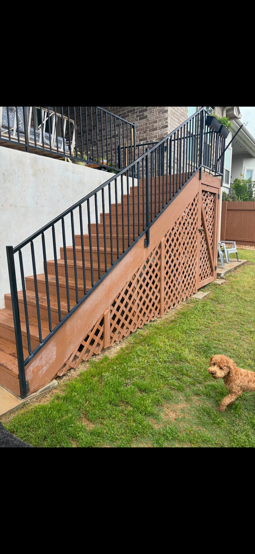 Before photo of Dripping Springs deck stairs and lattice before staining