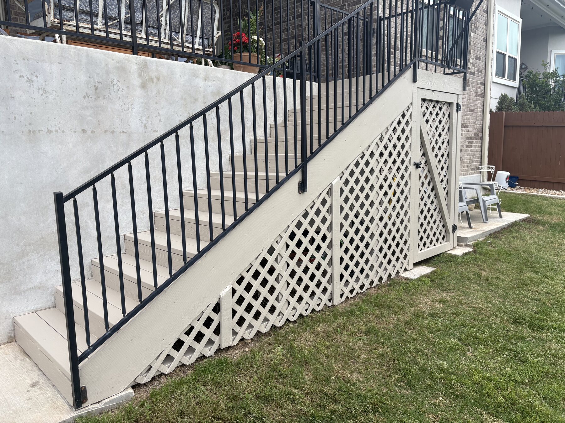 After photo of Dripping Springs deck stairs and lattice after staining