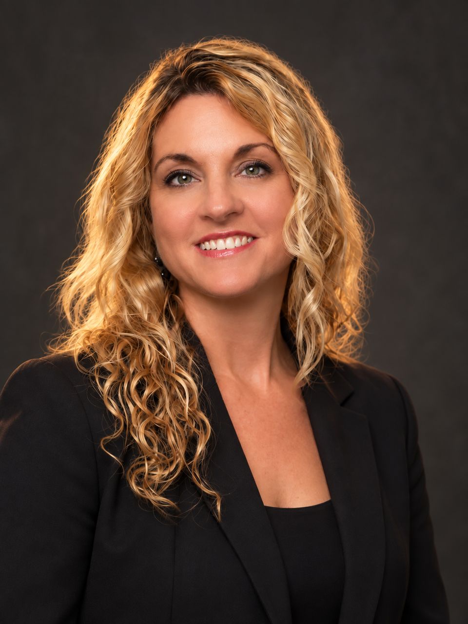 Studio portrait of Kim Tromba, co-founder of Fix and Fashion
