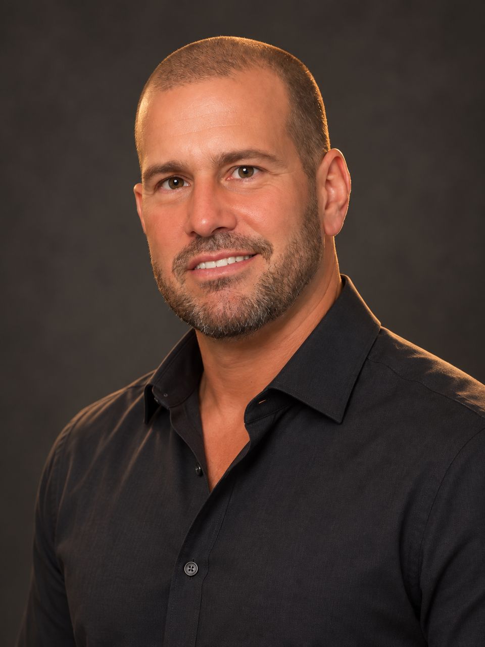 Studio portrait of Mike Tromba, co-founder of Fix and Fashion