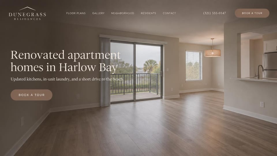 Apartment website design, coastal apartments with a renovated unit up front: taupe-tinted photo of an empty renovated living room with plank floors and a balcony door to palm trees, cream serif headline, rounded taupe tour button