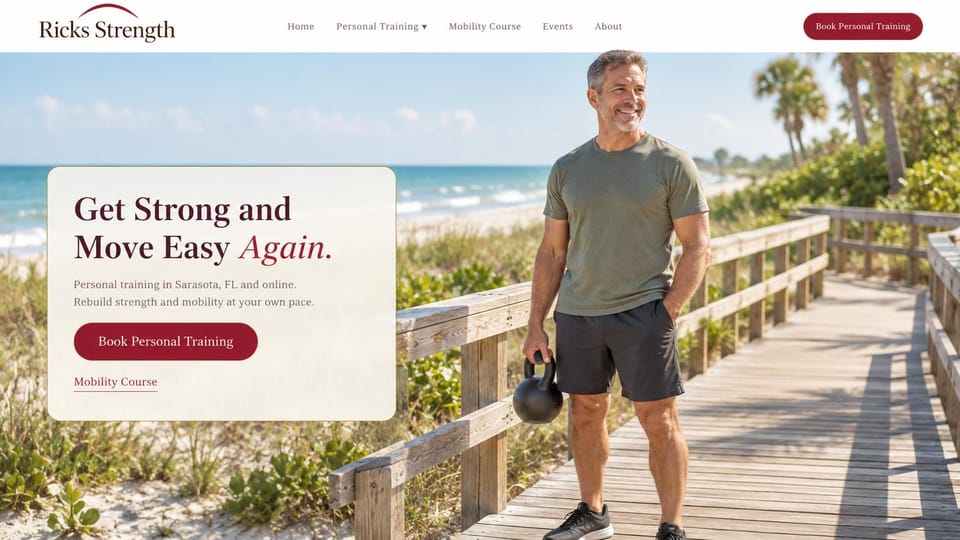 Personal trainer website design, strength and mobility training on a beach boardwalk: white menu bar, a sunny beach boardwalk photo of a fit middle-aged man carrying a kettlebell, a rounded cream panel with a dark serif headline and a burgundy italic word, a burgundy booking button