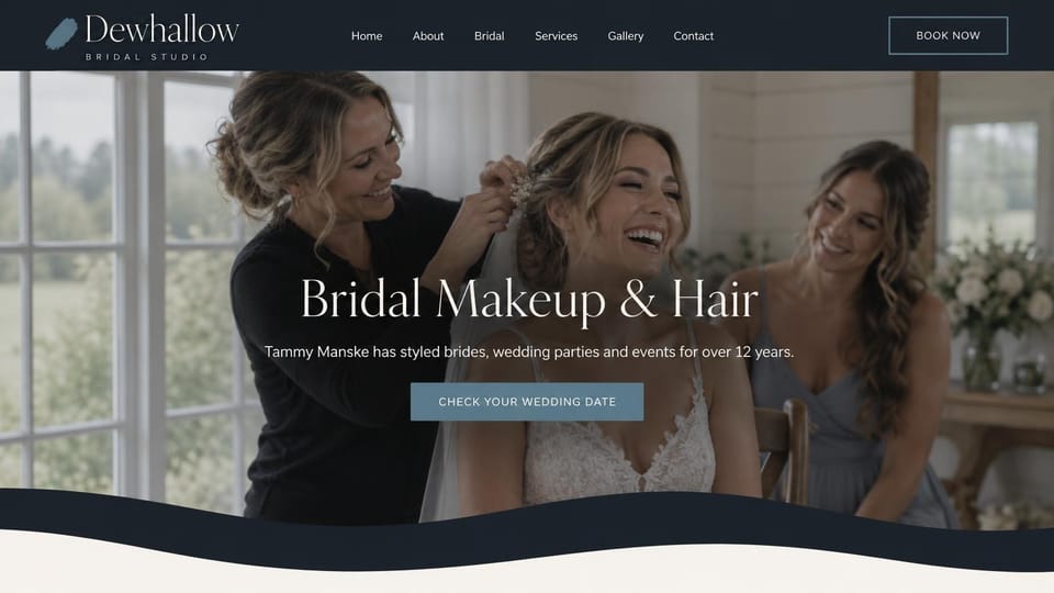 Makeup artist website design, bridal artist with a laughing bridal party: navy header over a darkened photo of an artist with a laughing bride and bridesmaid, a white serif headline, a slate blue button