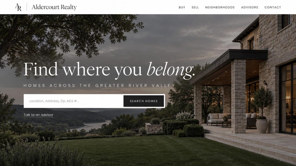 Real estate website design, river valley homes with search in the hero: a stone house at dusk above a river valley, a white serif headline with an italic word and a search box