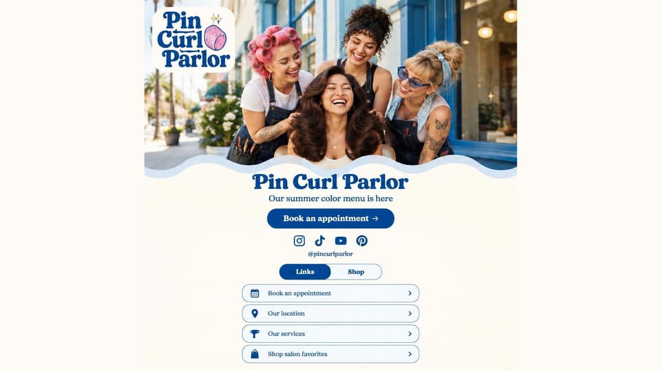 Salon website design, salon link page for social profiles: cream page, a retro blue logo above stylists laughing with a client, and a stack of link buttons