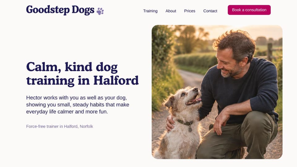 Pet business website design, force-free dog training in the trainer's own name: off-white page, a navy serif headline and magenta consultation button, a man kneeling with a scruffy dog on a country lane
