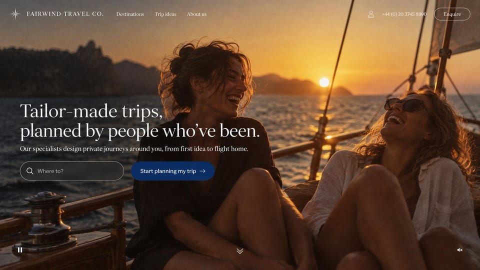 Travel agency website design, tailor-made trips with a video hero and search: sunset video still of two friends laughing on a sailboat deck, white serif headline at left, a where to search field and a navy planning button