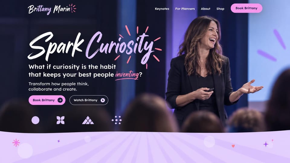 Speaker website design, creativity keynote speaker with a hand-lettered headline: dark stage photo of a laughing woman speaker with a clicker, white and lilac brush-script headline, pink pill buttons, a lilac band of shapes below