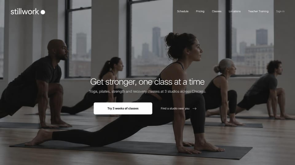 Fitness website design, yoga and strength studios across one city: grey-toned photo of a class in lunges by tall windows, white centered headline and a white button