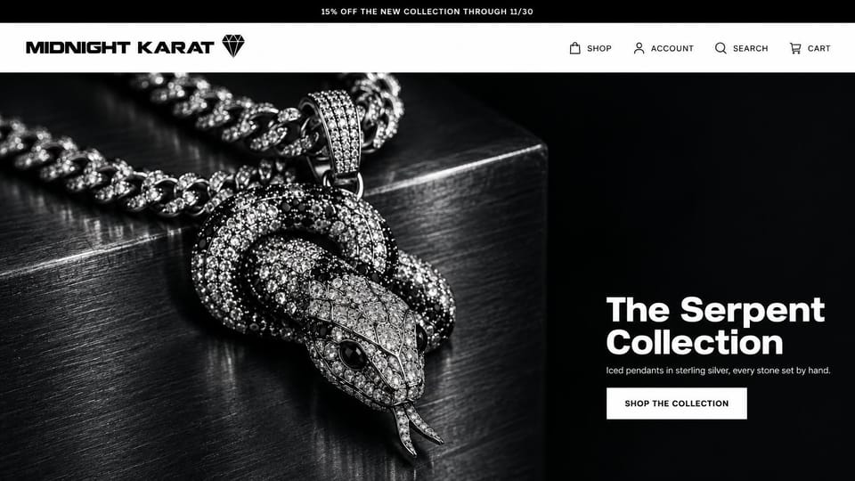 Jewelry website design, iced silver pendants in black and white: black top bar, white menu, a black and white photo of a pavé serpent pendant on a curb chain over dark stone, a bold white headline and a white button