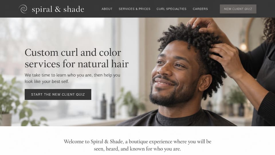 Business website design, curl and color salon with a new client quiz: charcoal menu bar, a bright salon photo of a smiling man with coily hair and a stylist's hands, a dark serif headline and a charcoal quiz button