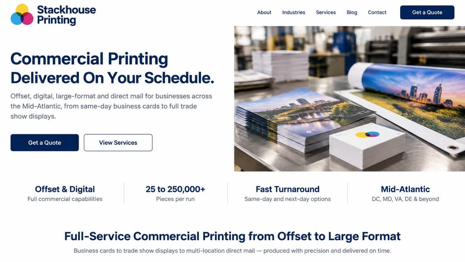 Printing website design, commercial printing with a row of quick facts: white page, a navy headline and buttons, stacked brochures, business cards and a banner roll on a steel table, a four-part facts row below