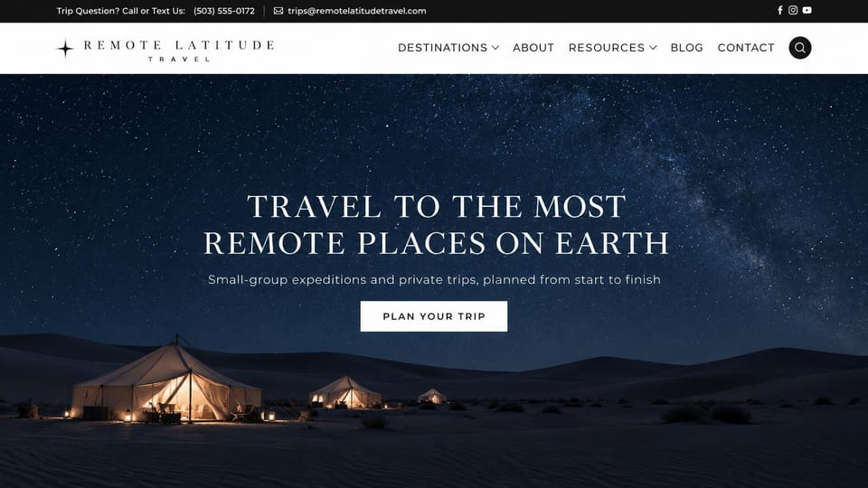 Travel agency website design, remote expeditions under a starry desert sky: white header with a black top bar, a deep navy night sky over lit desert tents, a white serif headline and a white plan your trip button