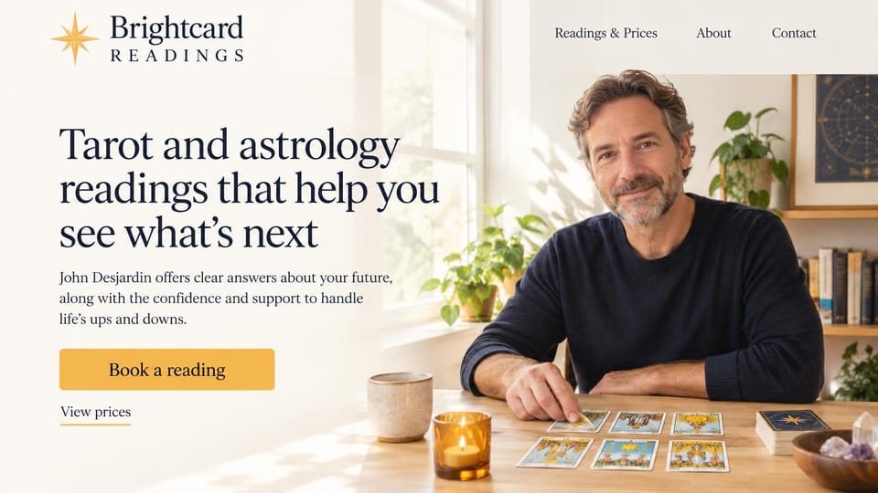 Astrology website design, tarot and astrology in a bright, sunny room: warm white page, a large dark serif headline and a mustard button beside a smiling gray-haired reader at a table of tarot cards