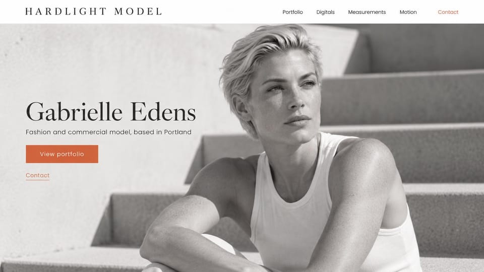 Model portfolio website design, fashion model in black and white on concrete steps: white header with spaced capitals, a full-bleed black and white photo of a woman with short blonde hair in a white tank on concrete steps, a large dark serif name and a coral button