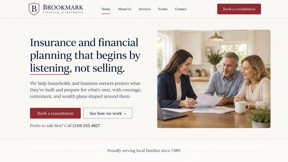Insurance agency website design, insurance and financial planning at the kitchen table: cream page, navy serif headline with a burgundy underline, burgundy consultation button and an advisor with a couple at a kitchen table