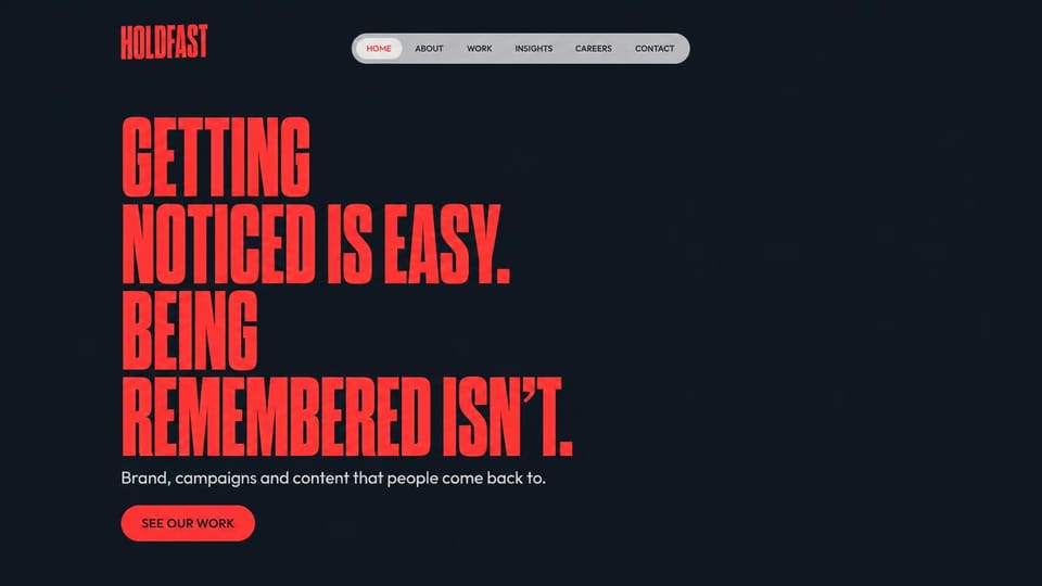 Agency website design, campaign agency in red condensed type: charcoal page, a stacked red condensed uppercase headline and a small red button