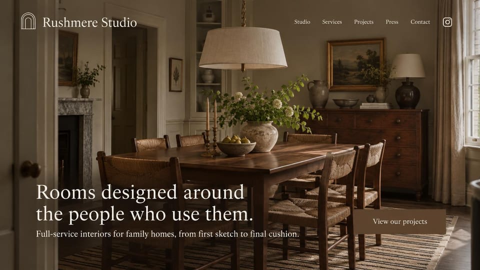 Interior design website design, family homes with a large serif promise: a dark traditional dining room with antiques, a large cream serif headline and a brown projects button