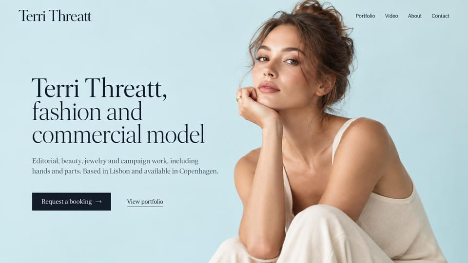 Model portfolio website design, beauty and parts model on pale blue: pale blue page, a large dark serif headline, a navy booking button and a soft portrait of a woman with her hair up in a cream camisole, chin on her hand