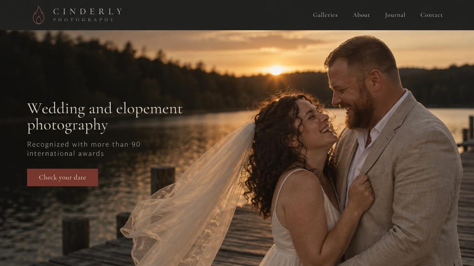 Wedding photographer website design, wedding and elopement photographer at a sunset lake: dark menu bar with a flame logo, a laughing couple embracing on a lake dock at sunset with a blowing veil, a cream serif headline and a deep red button