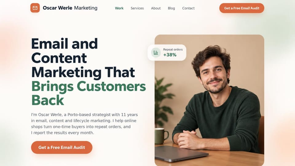 Marketing portfolio website design, email and content marketer with a free audit: warm cream page, a navy and green headline, coral buttons and a smiling man at a desk with a stat card