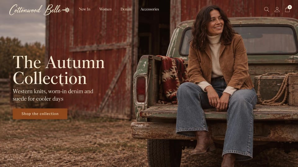Fashion website design, western boutique on a pickup tailgate by a red barn: a smiling woman in a suede jacket and jeans on an old pickup tailgate by a red barn, a script logo, a white serif headline and a rust button