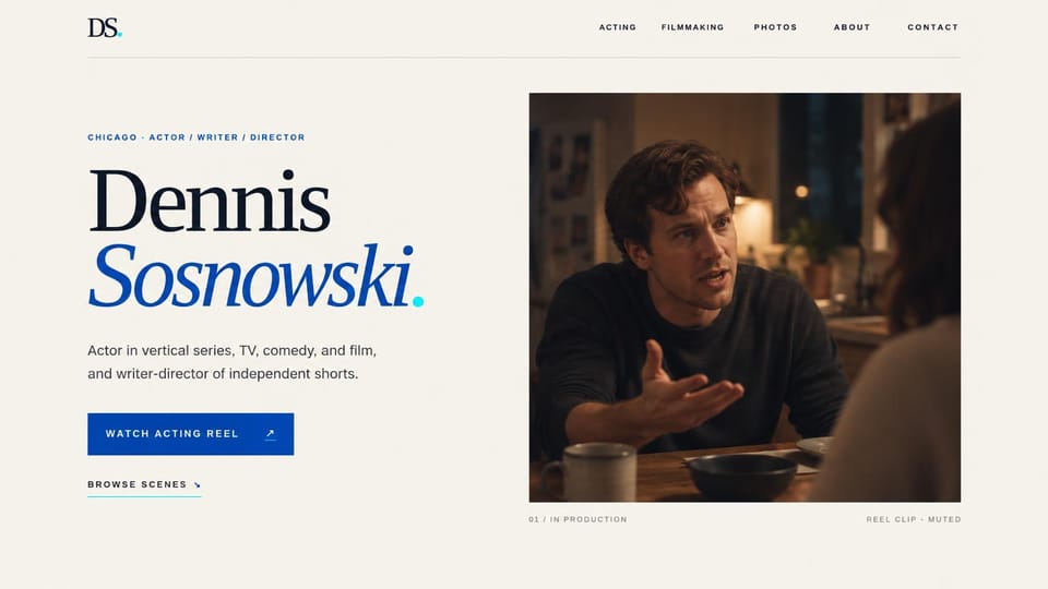 Actor website design, actor and filmmaker with a framed scene still: cream page, a huge navy serif name with a blue italic surname, a blue reel button and a framed film still of a man talking at a kitchen table