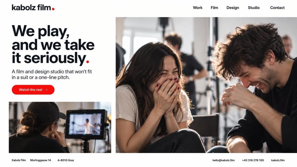 Videographer website design, film and design studio with a playful headline: off-white page, black wordmark with a red dot, large bold black headline ending in a red full stop, red pill reel button, two actors laughing on set beside a smaller shot of a crew member watching a monitor, address and contact strip along the bottom