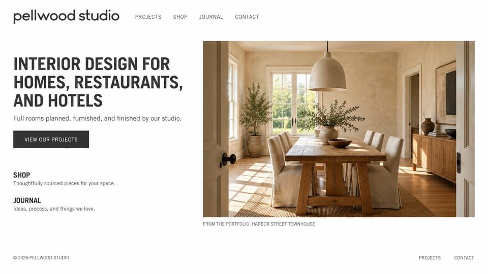 Interior design website design, homes, restaurants and hotels in bold type: white page, a bold condensed charcoal headline, a black button and a captioned photo of a sunlit dining room