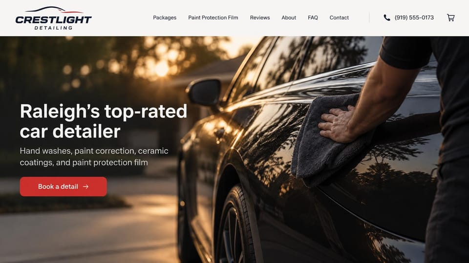 Car detailing website design, detail shop with a hand wipe at golden hour: light header with a swooping car logo, a warm sunset photo of a hand wiping a black car with a microfiber towel, a white headline, a red button