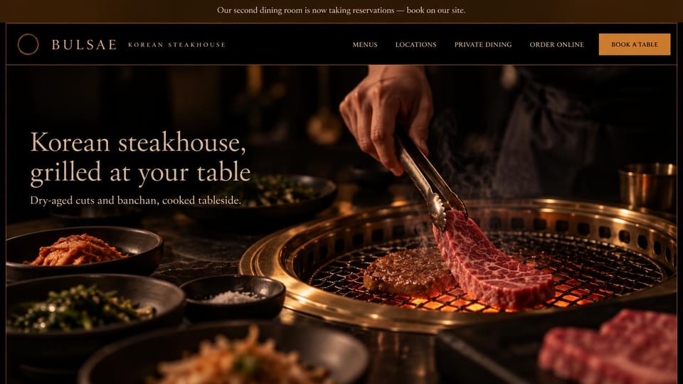 Restaurant website design, korean steakhouse with tableside grilling: black and gold, a hand grilling marbled beef at the table under a light serif headline