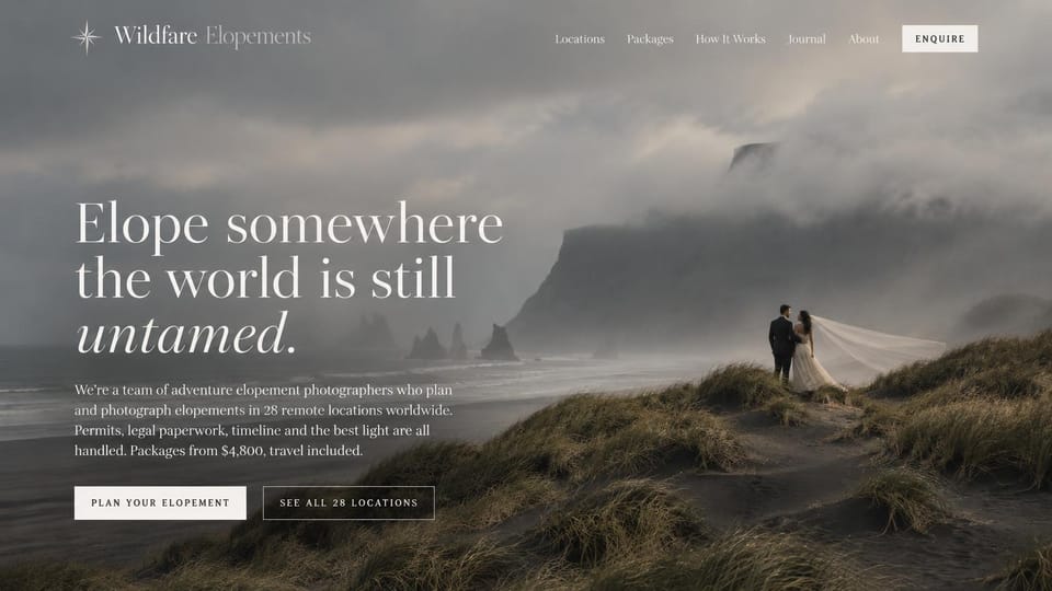 Wedding photographer website design, adventure elopement team on wild coastlines: misty grey sea cliffs and dune grass with a small couple and a flowing veil, large white serif headline with an italic word, two outlined buttons
