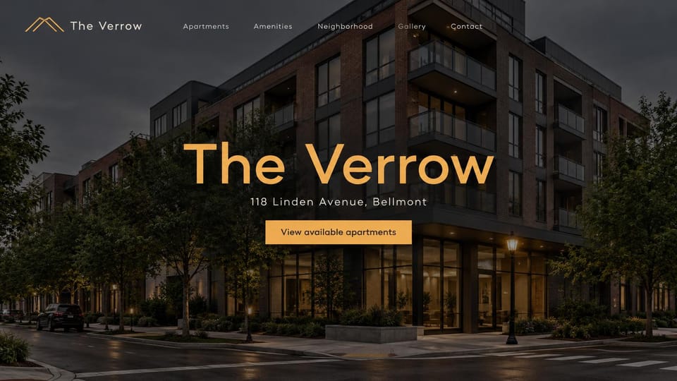 Apartment website design, corner building at dusk with its name in gold: a brick and glass corner building at dusk under a dark overlay, a large golden sans name, an address line and a gold button