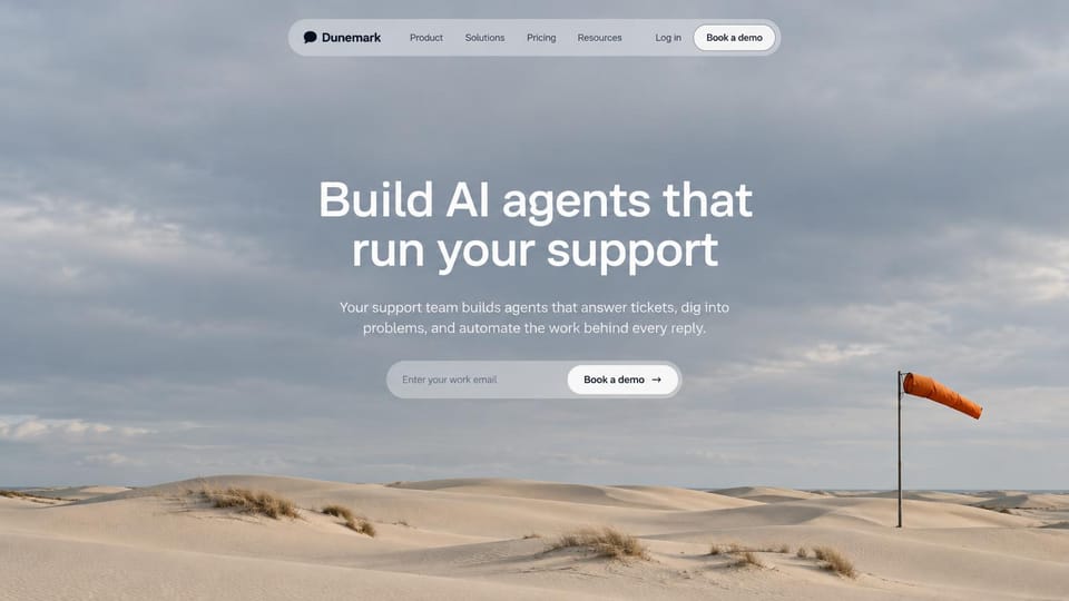 AI startup website design, aI support agents under a quiet desert sky: gray sky over pale dunes with an orange windsock, white centered headline, a pill nav and an email field with a demo button