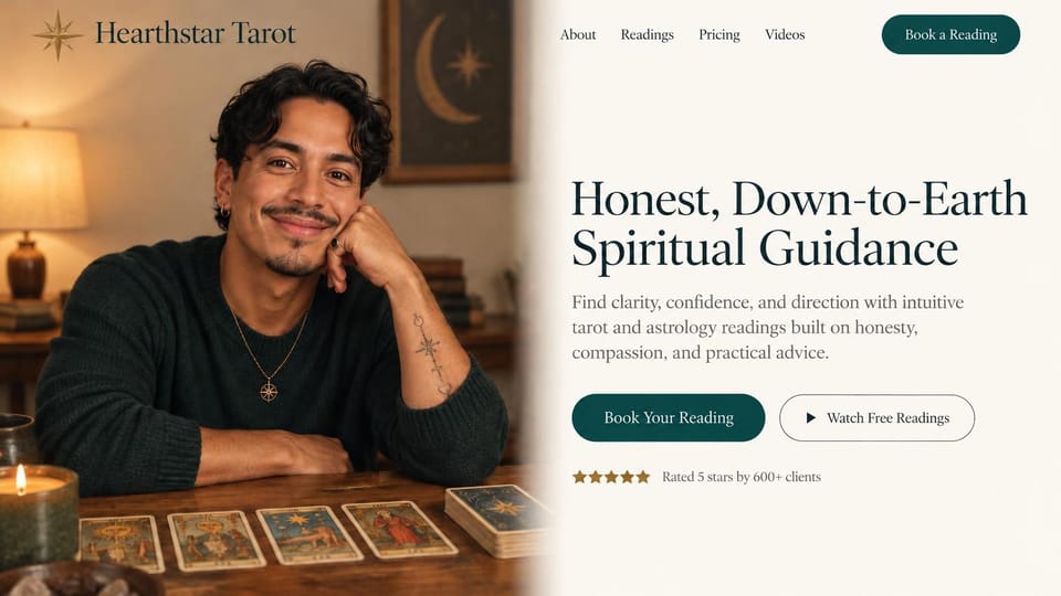 Astrology website design, tarot and astrology with free video readings: a smiling reader at a table of tarot cards fading into a cream panel with a dark serif headline and teal buttons