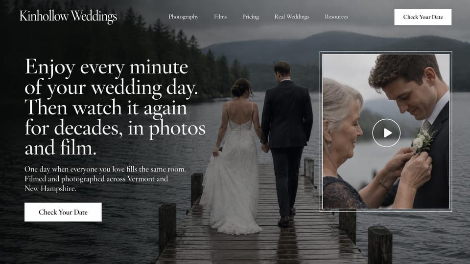 Wedding photographer website design, photo and film team with a video preview on a misty dock: misty lake with a couple walking down a wooden dock, a large white serif headline at left, a framed video preview of an older woman pinning a groom's flower, white check your date buttons
