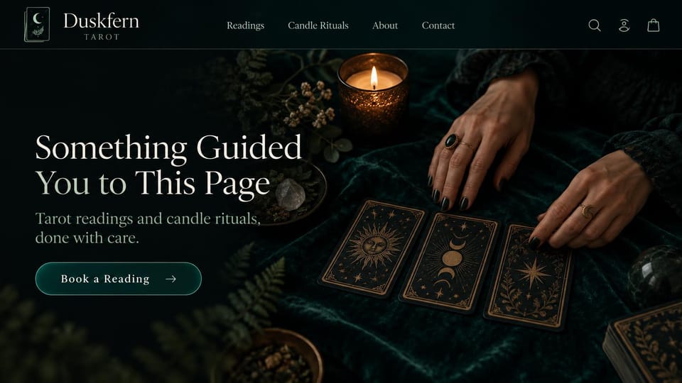 Astrology website design, tarot and candle rituals in dark green: deep green velvet, hands with dark nails over black and gold tarot cards beside a candle, a cream serif headline and a teal outlined button
