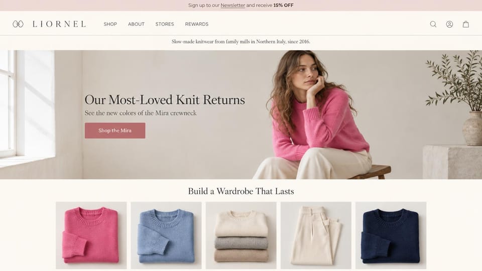 Fashion website design, knitwear with a bestseller back in new colors: blush top bar, cream header with a spaced logo, a woman in a pink crewneck on a stool by a bright window, a dark serif headline and a dusty rose button, five folded knits and trousers below