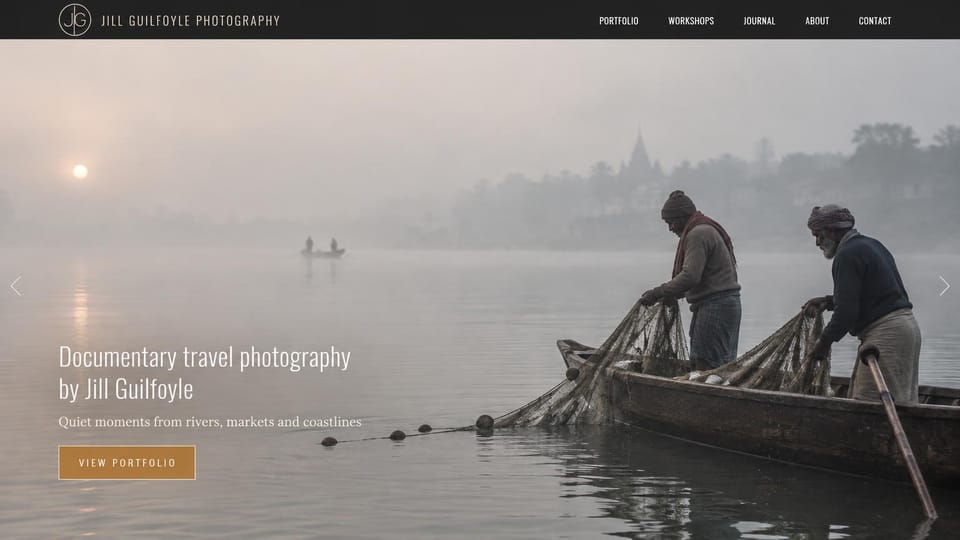 Photography website design, travel documentary in morning mist: a misty river at sunrise with two fishermen and their nets, white text and an ochre portfolio button