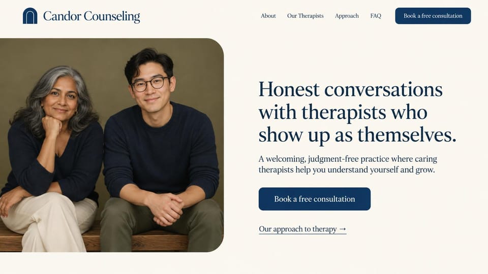 Business website design, group practice with two therapists side by side: cream page, a rounded photo of two smiling therapists in navy sweaters on a bench, a large navy serif headline and a navy button