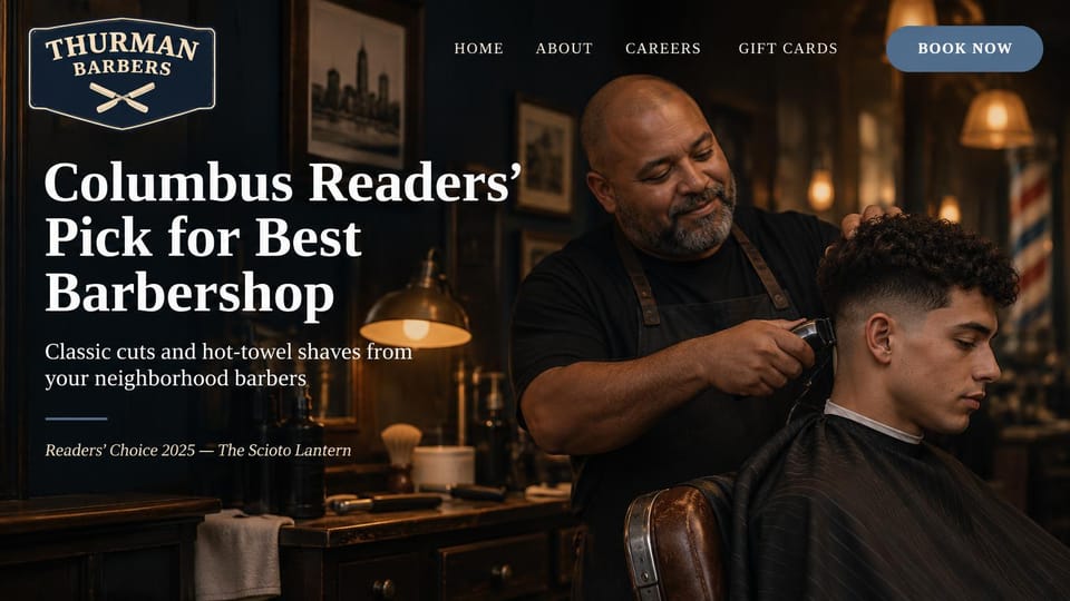 Barbershop website design, neighborhood barbershop with a readers' award headline: dark warm shop with a barber fading a young man's curly hair, a navy badge logo with crossed razors, a large white serif headline and a slate blue book button