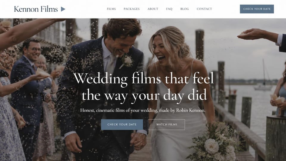 Videographer website design, wedding films with a petal-toss exit: a bride and groom laughing under thrown petals on a harbor dock, centered white serif headline, slate blue date button and an outlined films button