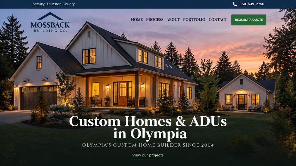 Construction website design, custom homes and ADUs in the evergreens: navy top bar, a white farmhouse and small cottage lit at sunset among firs, a centered white serif headline and a green quote button