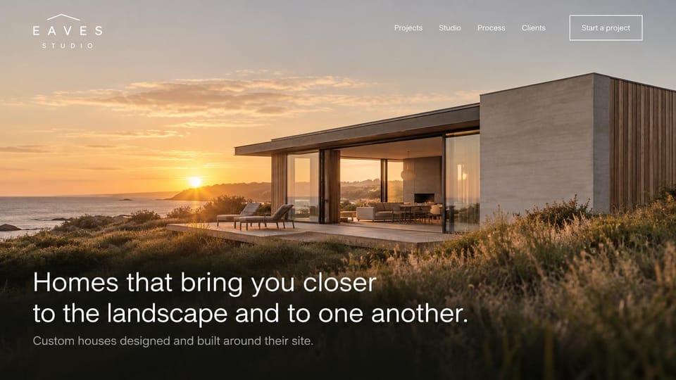 Architecture website design, custom homes that fit the landscape: a concrete and timber house on a grassy coastal bluff at sunset, a thin letter-spaced wordmark, an outlined button, a large white two-line headline at lower left